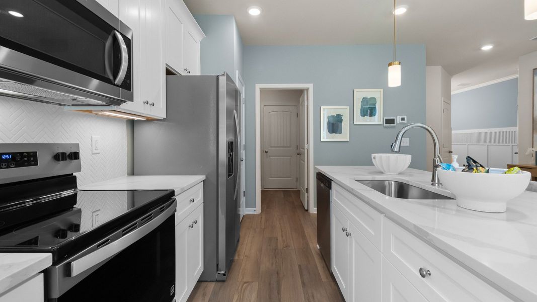 Furnished interior in a model home at McClure Farms Townhomes in Columbia (Image 6).