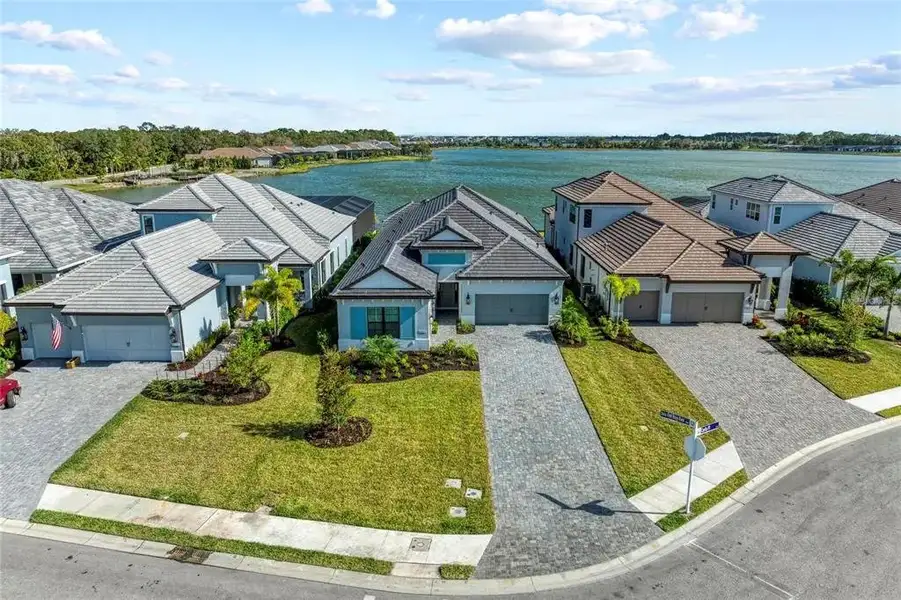 Aerial view of the The Alcove at Waterside community in Sarasota, FL, showing layout and nearby surroundings (Image 1). Aerial view of the The Alcove at Waterside community in Sarasota, FL, showing layout and nearby surroundings (Image 1).