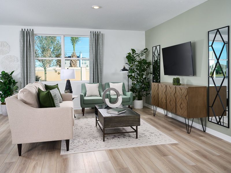 Family room in Hibiscus floorplan modeled at Lawson Dunes