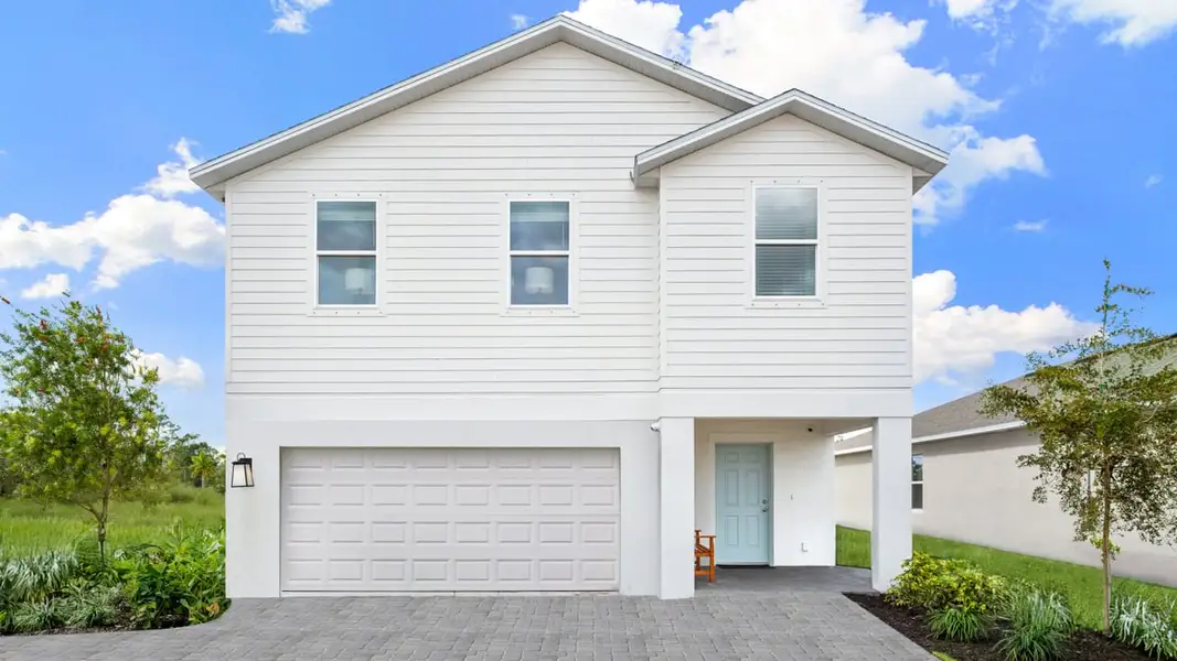 Front exterior of a home in the Solena community, located in North Fort Myers, FL (Image 3).