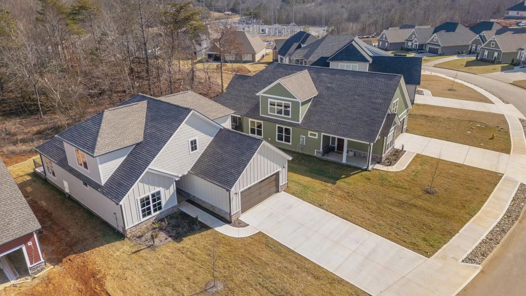 Aerial view of the The Grove at Haven Hill community in Lenoir City, TN, showing layout and nearby surroundings (Image 1). Aerial view of the The Grove at Haven Hill community in Lenoir City, TN, showing layout and nearby surroundings (Image 1).