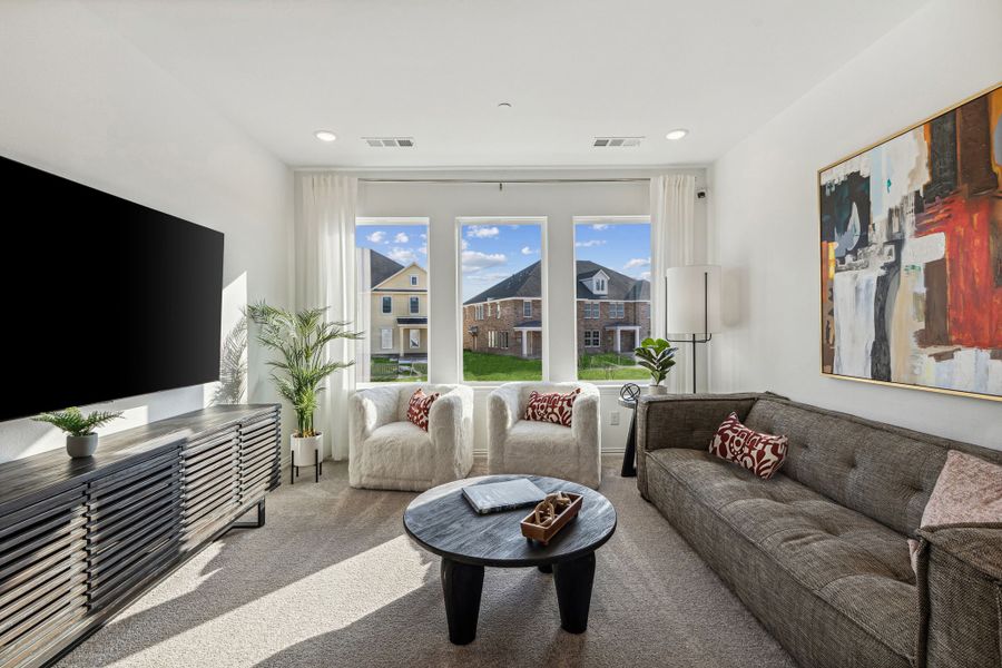 Furnished interior in a model home at Village on Main Street in Frisco (Image 31).