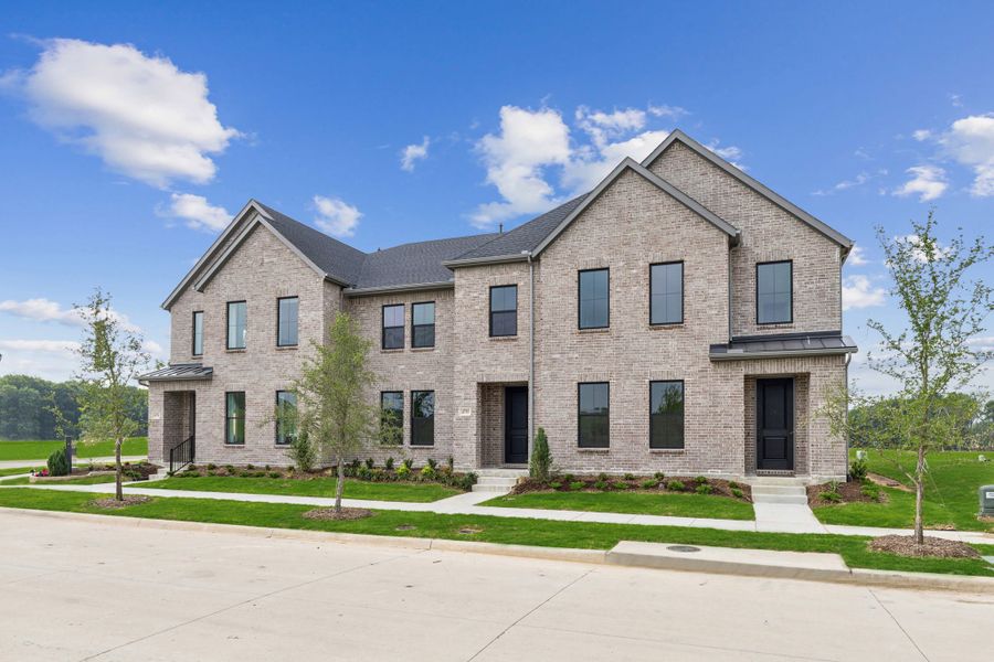Front exterior of a home in the Painted Tree - Woodland District community, located in McKinney, TX (Image 5).