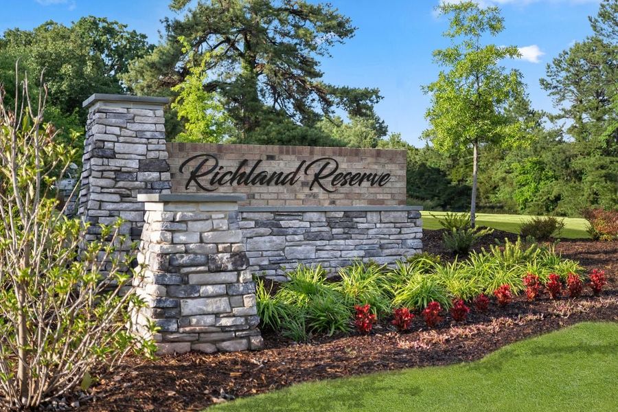 Entrance to the Richland Reserve community in Raleigh, NC, featuring signage and landscaping (Image 1).