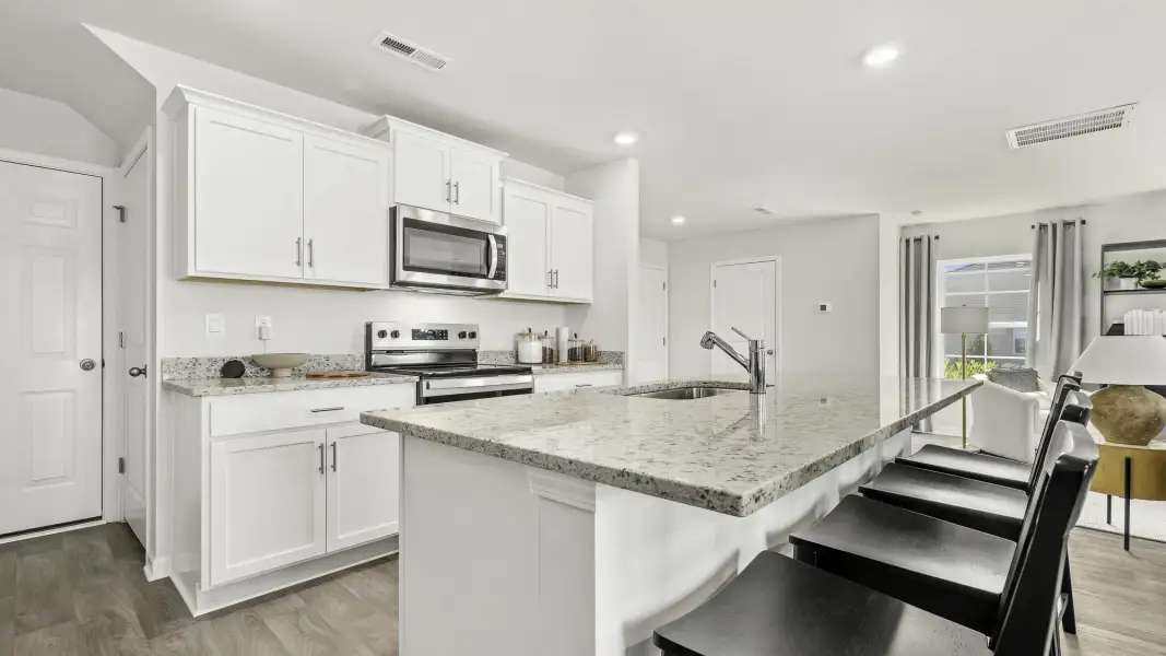 Furnished interior in a model home at Northbrooke Village in Madison (Image 11).