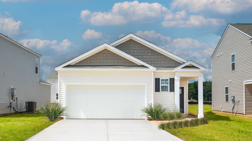 Front exterior of a home in the Palm Ridge community, located in Guyton, GA (Image 13).