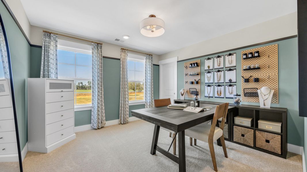 Furnished interior in a model home at Bayview Acres in Mount Pleasant (Image 5).