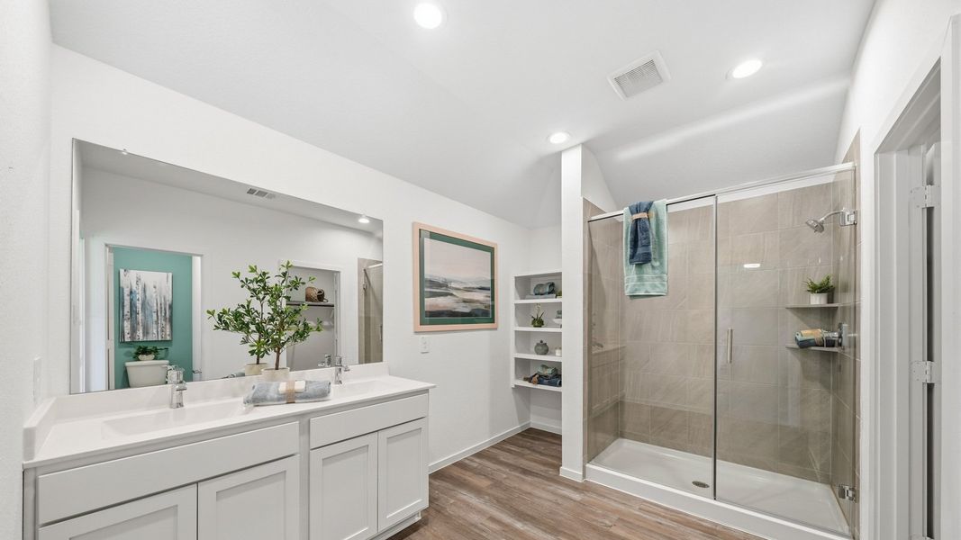 Furnished interior in a model home at Sunterra in Katy (Image 43).