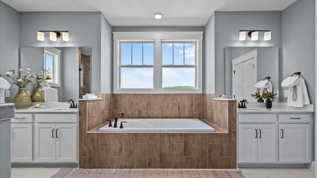 Furnished interior in a model home at Woodland Summit in Simpsonville (Image 30).