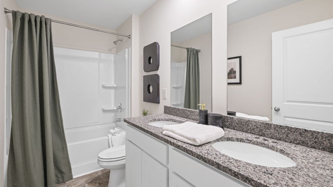 Furnished interior in a model home at Hawks Landing in Apison (Image 39).