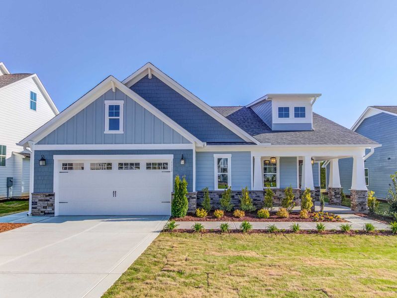 Front exterior of a home in the Cedar Crest - Fuquay-Varina - Robuck Homes community, located in Fuquay Varina, NC (Image 2).