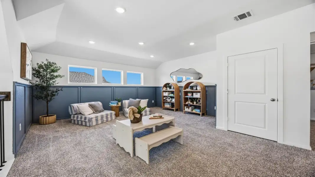 Furnished interior in a model home at Lago Mar 60' Homesites in Texas City (Image 22).