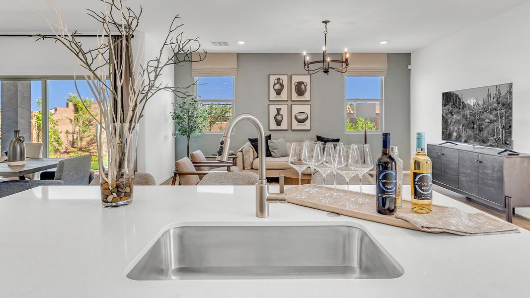 Furnished interior in a model home at Coronet at Gladden Farms in Marana (Image 12).