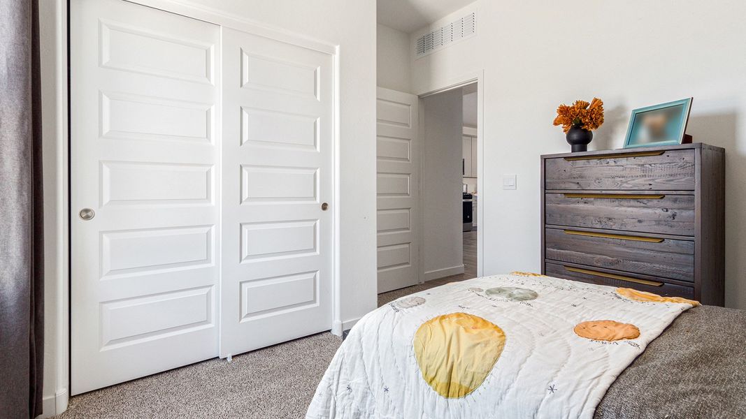 Furnished interior in a model home at Redford Estates in Tucson (Image 28).