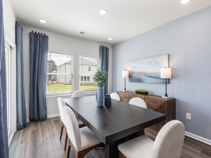 Dining area in the Chandler floorplan at a Meritage Homes community in Angier, NC.