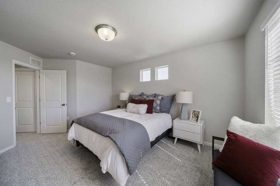 Furnished interior in a model home at Coach House at Green Valley Ranch in Aurora (Image 8).