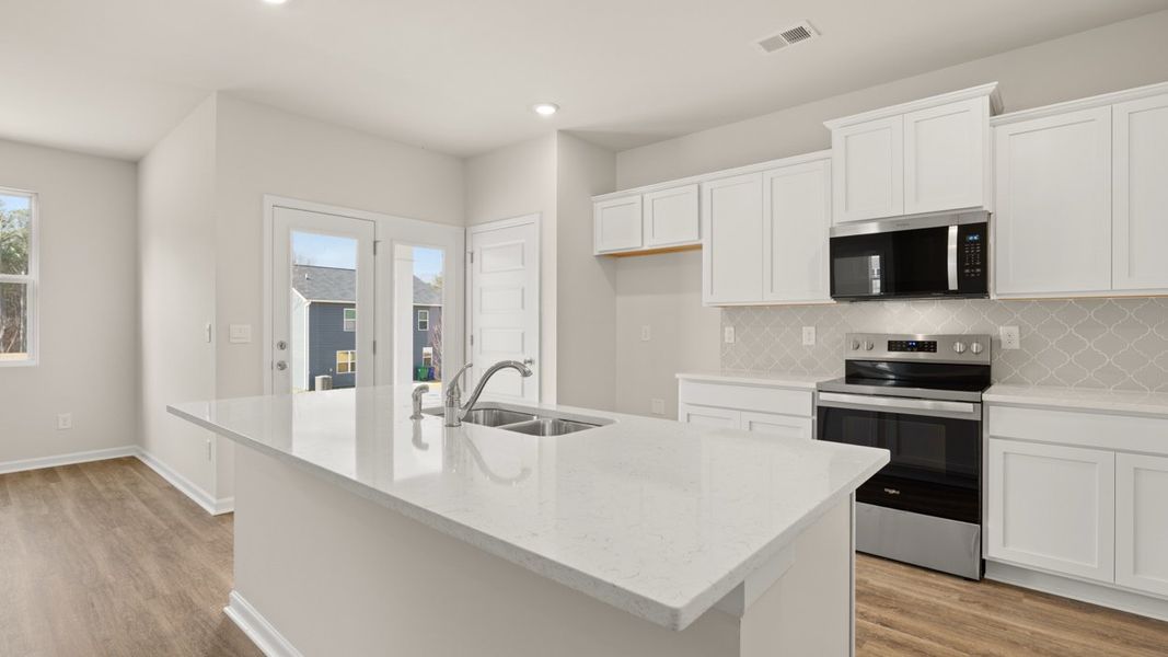 Furnished interior in a model home at Champion's Run in Lithonia (Image 25).