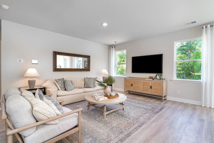 Furnished interior in a model home at Waterbridge in Myrtle Beach (Image 67).