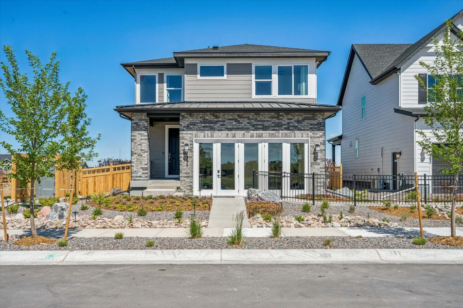 A house with a fence around it. A house with a fence around it.