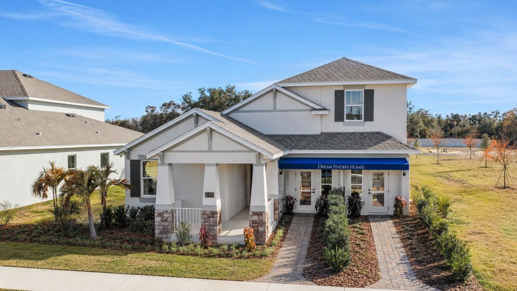 Front exterior of a home in the Avalon Woods community, located in Winter Garden, FL (Image 4). Front exterior of a home in the Avalon Woods community, located in Winter Garden, FL (Image 4).