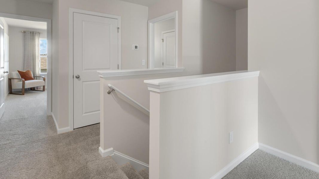 Furnished interior in a model home at Grayson Park Townhomes in Leland (Image 30).