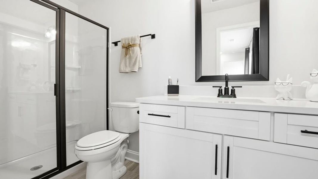 Furnished interior in a model home at Rutledge Estates in Woodruff (Image 31).