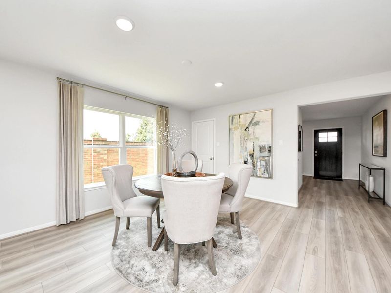Furnished interior in a model home at Sunterra in Katy (Image 15).