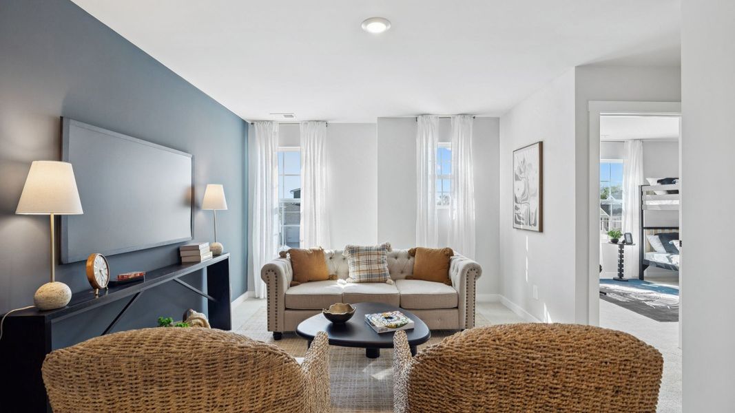 Furnished interior in a model home at Harvest Point in Spring Hill (Image 43).