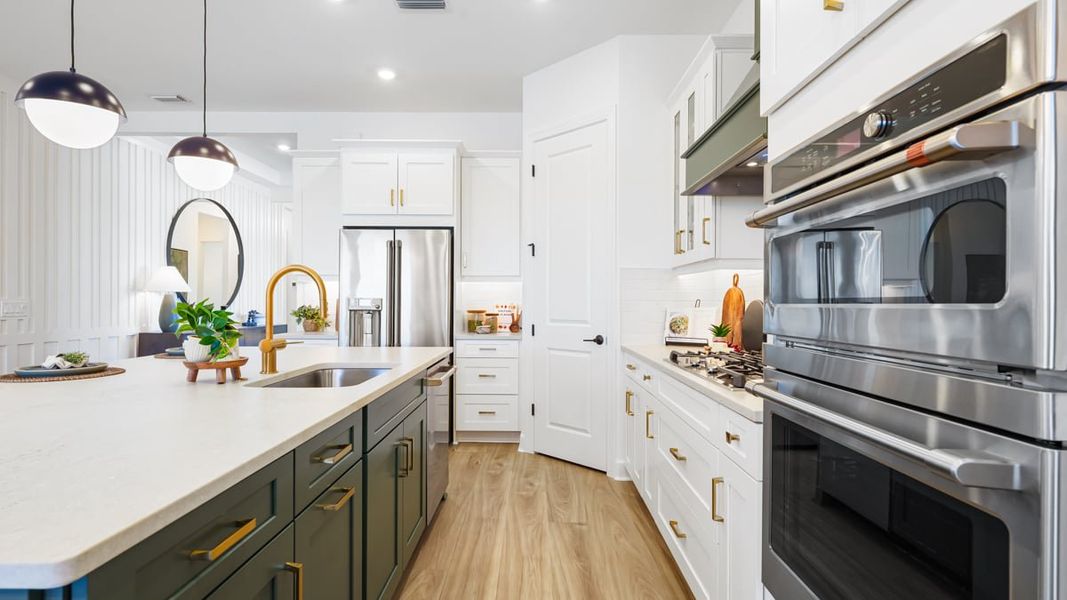 Furnished interior in a model home at Esplanade by the Islands in Naples (Image 36).