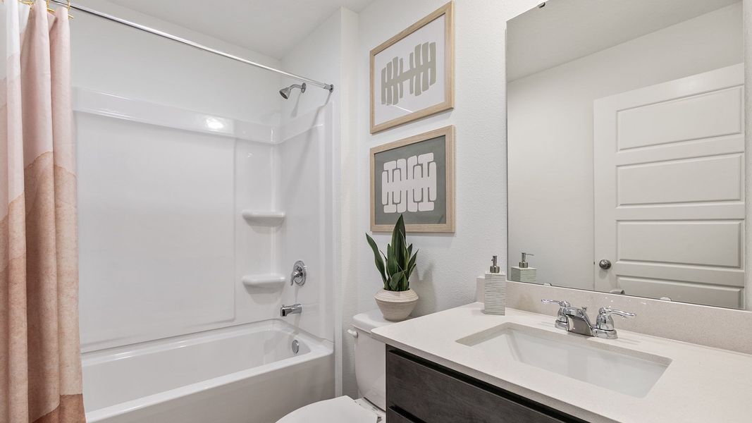 Furnished interior in a model home at Copes Landing in Jacksonville (Image 58).