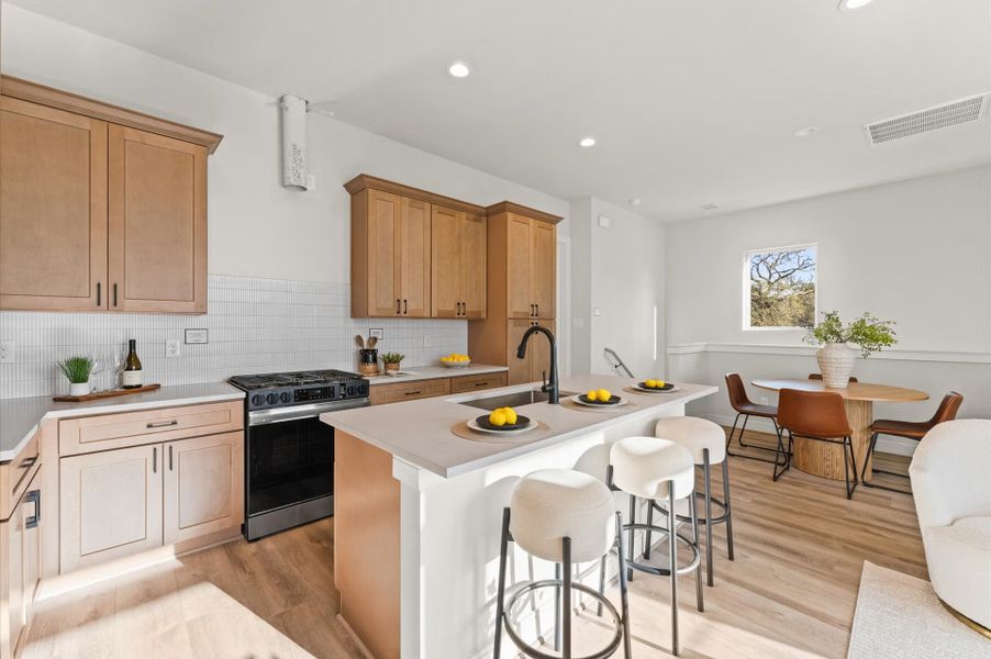 Furnished interior in a model home at Highland Gardens in Houston (Image 15).