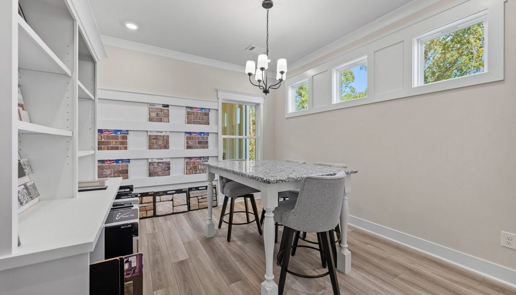 Furnished interior in a model home at Rosewood Lake Preserve in Hoschton (Image 32).