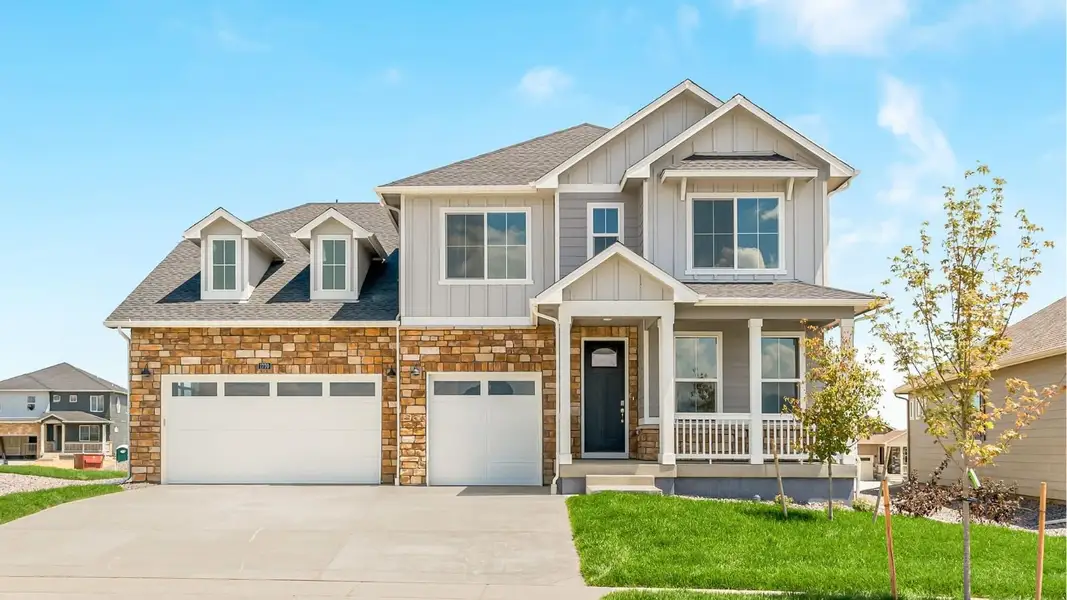 Front exterior of a home in the Vantage community, located in Berthoud, CO (Image 3).