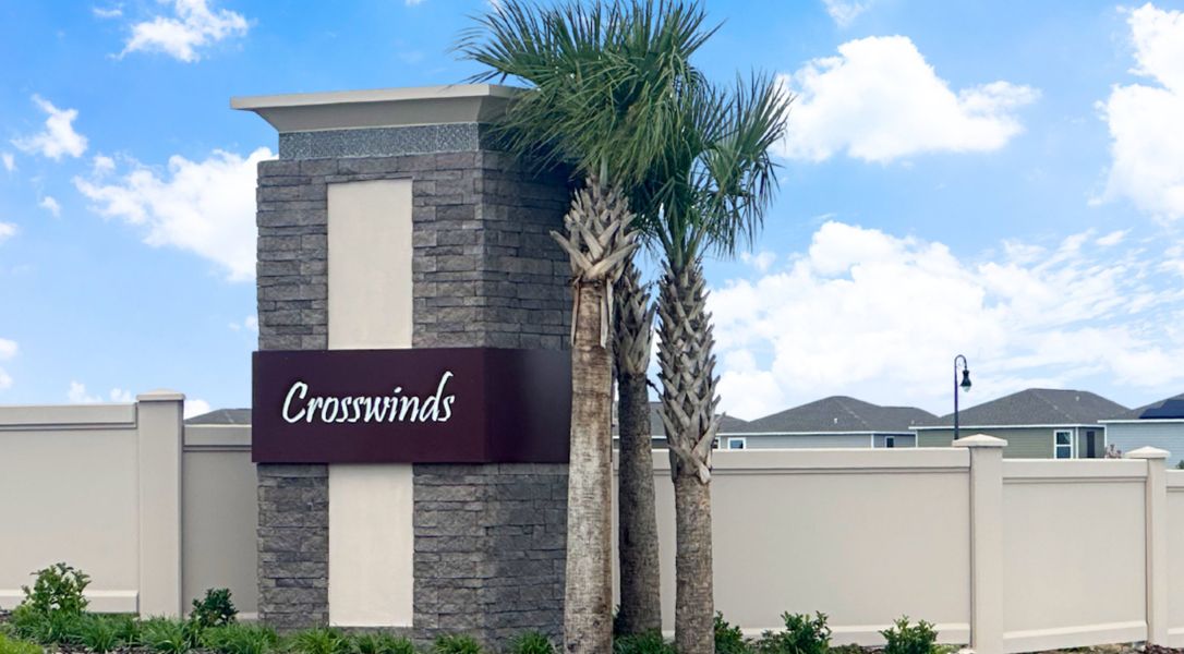 Entrance to the Crosswinds community in Haines City, FL, featuring signage and landscaping (Image 10). Entrance to the Crosswinds community in Haines City, FL, featuring signage and landscaping (Image 10).