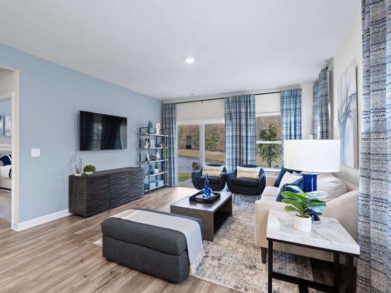 The family room offers plenty of natural light and space to catch up with friends.