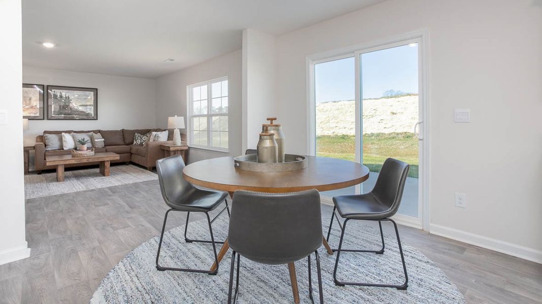 Furnished interior in a model home at Preston Oaks in King (Image 22).