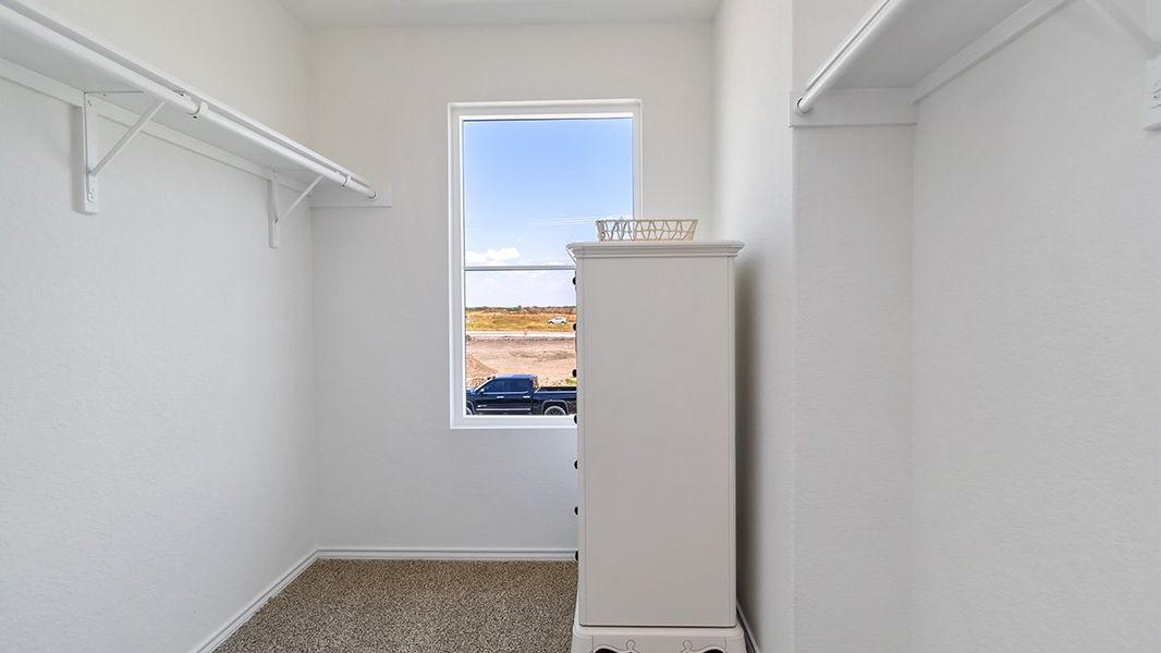 Furnished interior in a model home at Sereno Springs in Converse (Image 36).