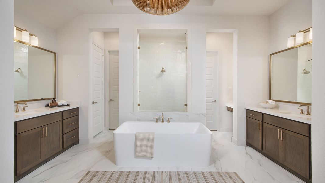 Furnished interior in a model home at The Highlands 65' in Porter (Image 19).