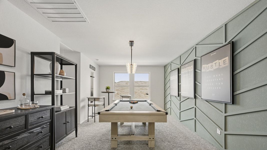 Furnished interior in a model home at Harrington Trails at The Canopies in New Caney (Image 7).