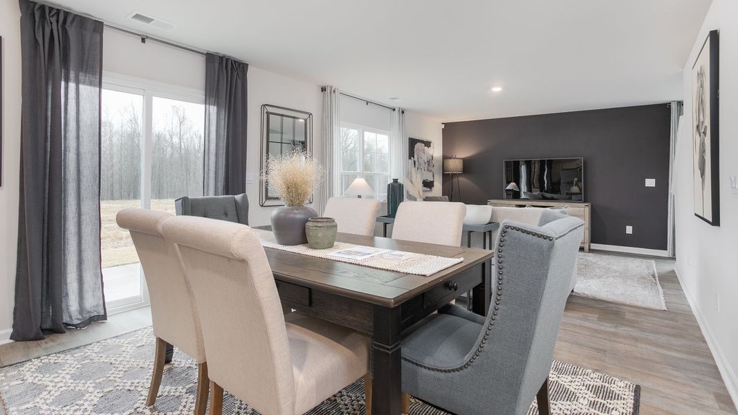 Furnished interior in a model home at Preston Oaks in King (Image 23).