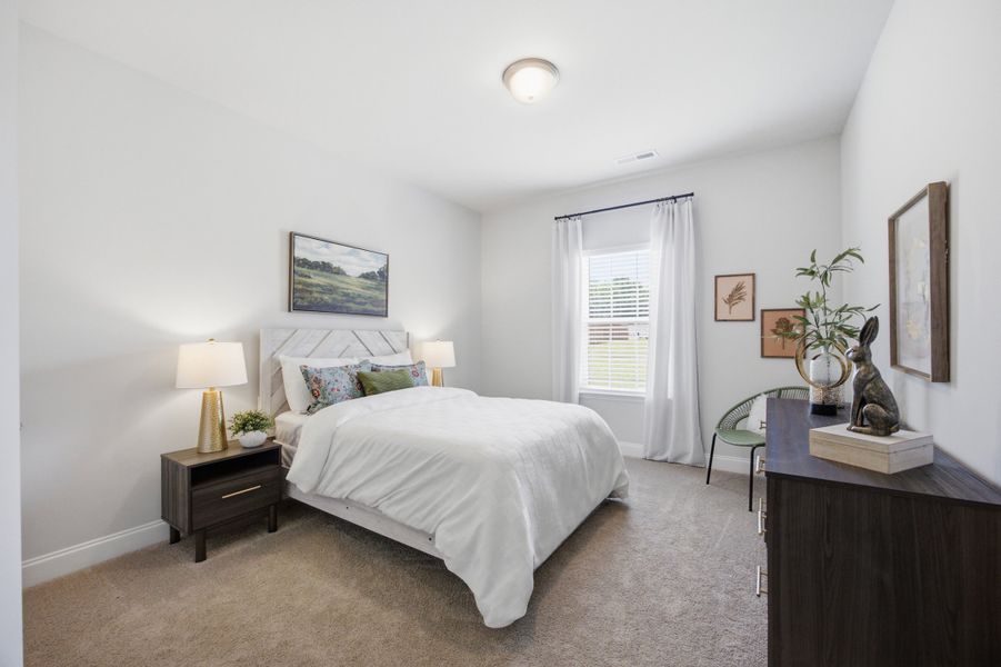 Furnished interior in a model home at Northlake in Statesville (Image 28).