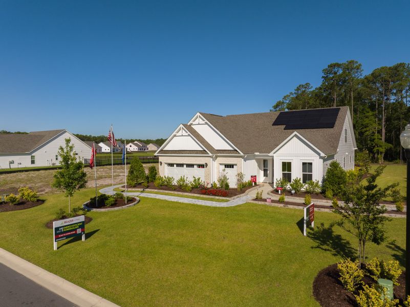 Front exterior of a home in the Northbrook community, located in Murrells Inlet, SC (Image 4). Front exterior of a home in the Northbrook community, located in Murrells Inlet, SC (Image 4).