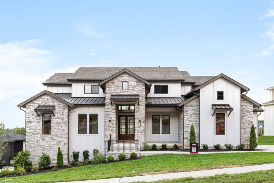 Front exterior of a home in the Falls at Fox Farm community, located in Arrington, TN (Image 9).