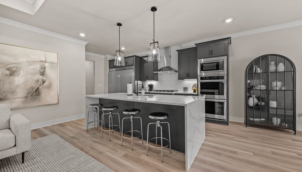 Furnished interior in a model home at Rosewood Lake Preserve in Hoschton (Image 19).