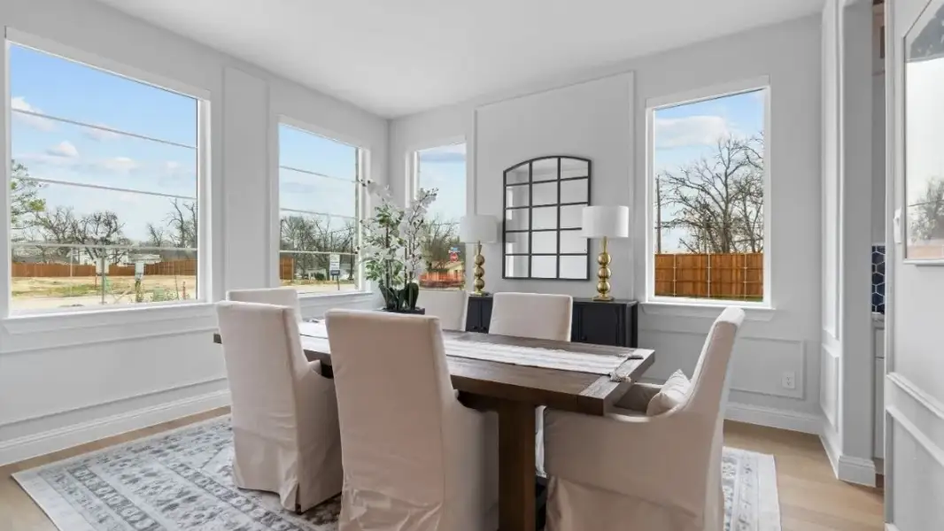 Furnished interior in a model home at Royal Court in Frisco (Image 4).