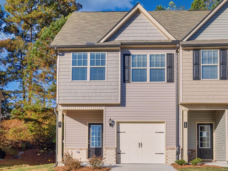 Front exterior of a home in the The Reserve at Clocktower community, located in Douglasville, GA (Image 15).