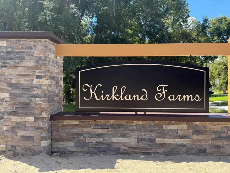 Entrance to the Kirkland Farms community in Alachua, FL, featuring signage and landscaping (Image 2). Entrance to the Kirkland Farms community in Alachua, FL, featuring signage and landscaping (Image 2).