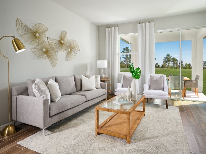 Furnished interior in a model home at Villages at Minneola Hills - Classic Series in Minneola (Image 5).