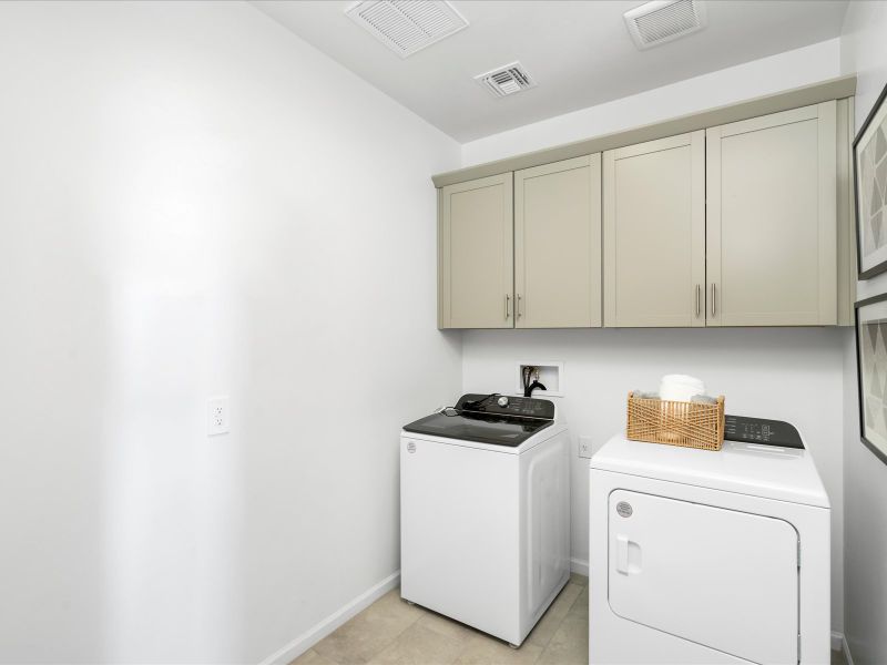 You'll find plenty of storage in the laundry room, plus a washer and dryer included in every home.