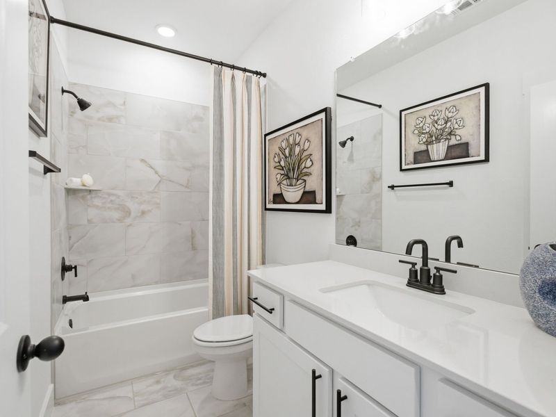 Furnished interior in a model home at Mercer Meadows in Royse City (Image 17).